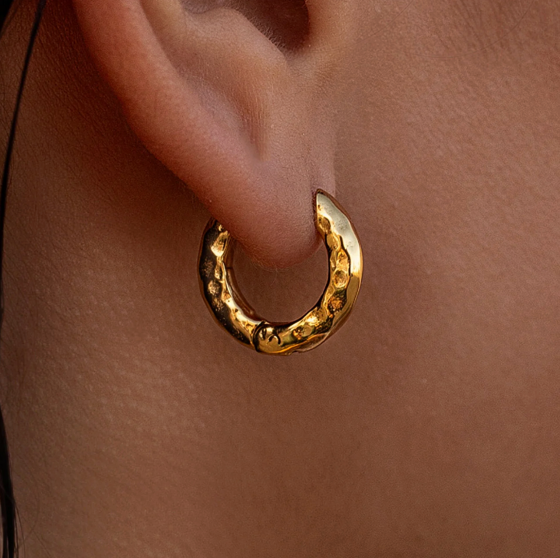 Source Huggies earrings front view hugging hoop style